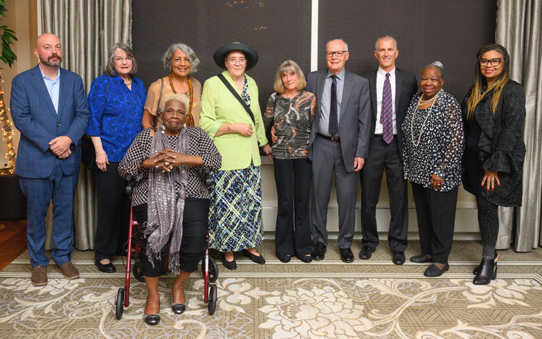 Dr. Steffan Genthe (left); the Claytor daughters with their friends; Dr. Peter and Mrs. Joan Lundeen; Dr Joseph Junewick ('88); family members.